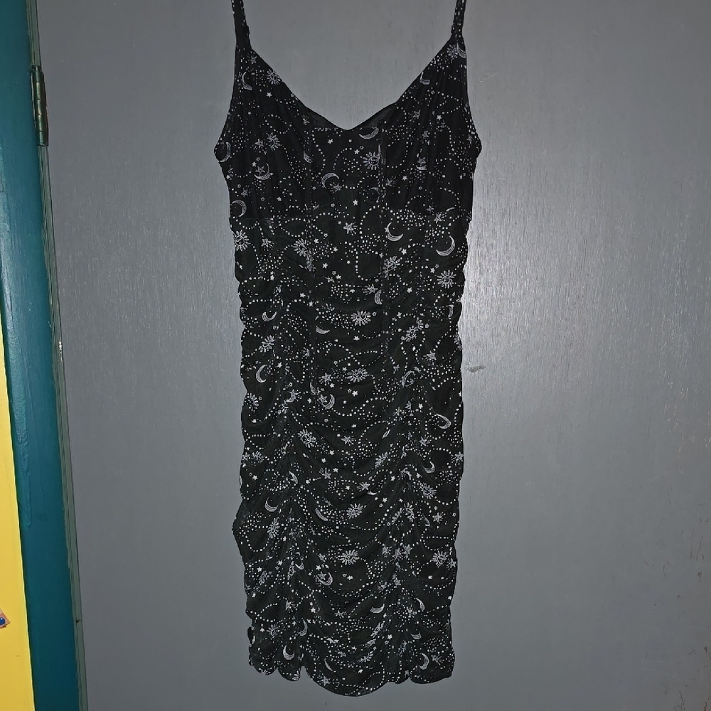 Black Mini Form Fitting ,Long Mini Or Pulled Up - image 1